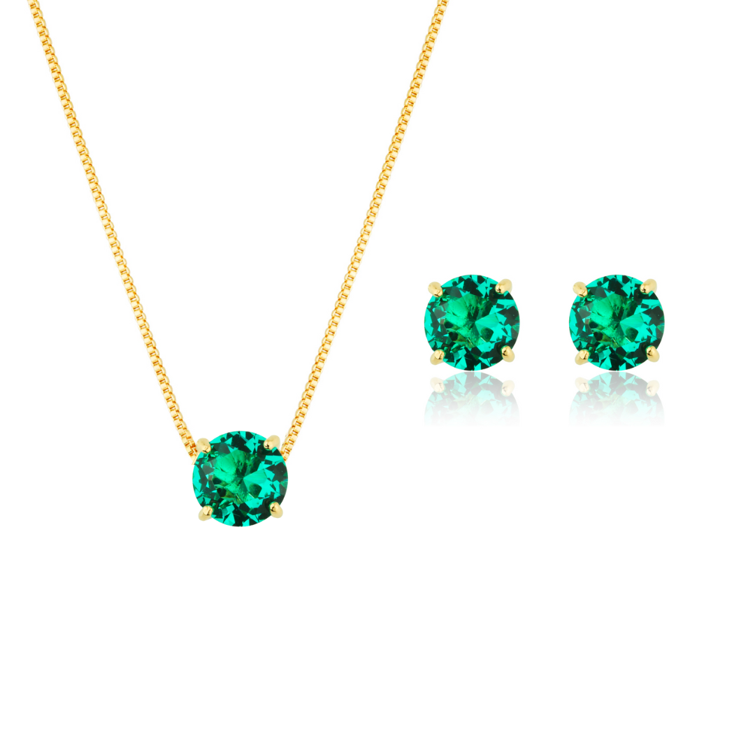 Set with green and round stones