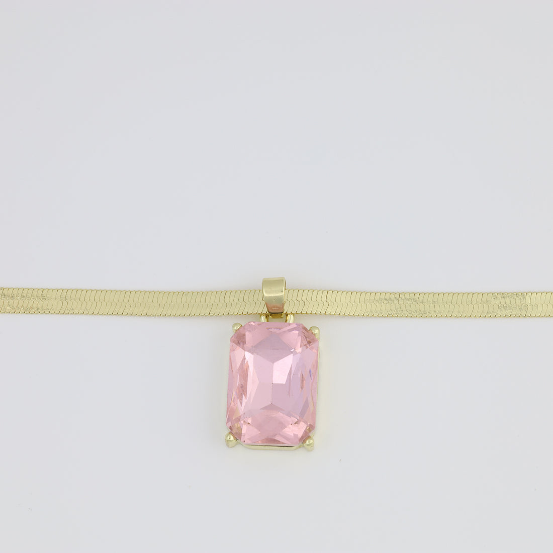 Necklace with herringbone link and pink stone
